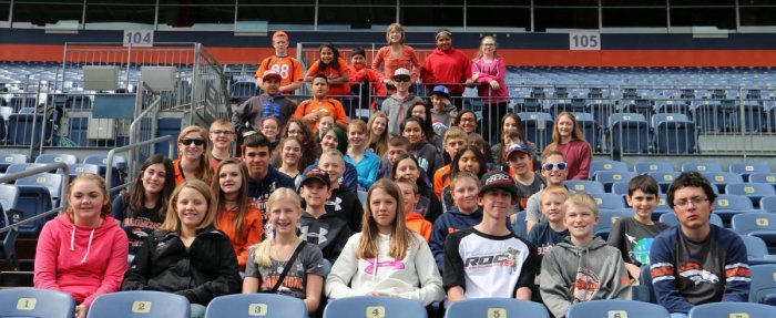 Image of students that were able to tour the Denver Broncos Stadium