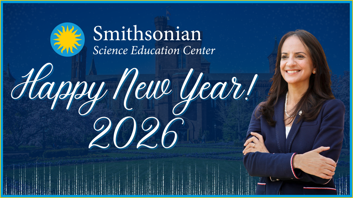 Carol O'donnell stands smiling with her arms crossed next to text that says Happy New Year 2026