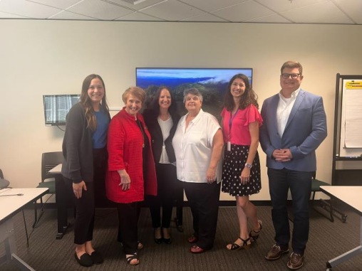 Dr. O’Donnell poses with State Senator Lisa Wellman and other lawmakers after her roundtable on Smithsonian Science for the Classroom.