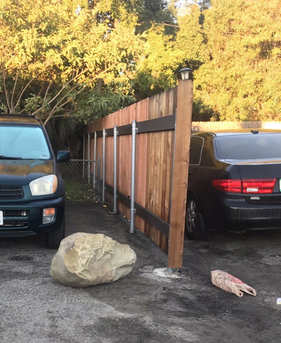 Boulder in front of car