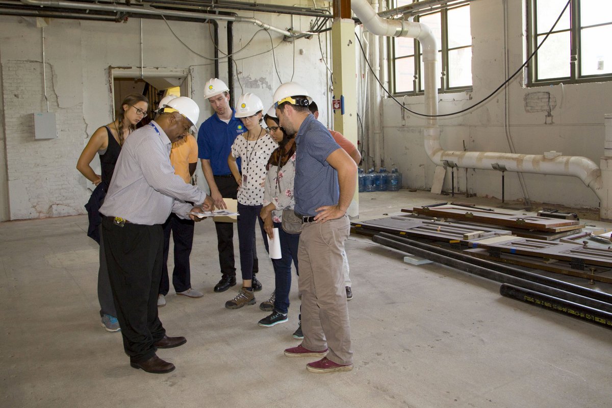 Smithsonian Institution interns view engineering plans