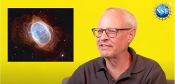 A yellow rectangle with a man in the center looking at an inset image of an image from the James Webb space telescope of the southern ring nebula that is blue oval with red radiating from it.