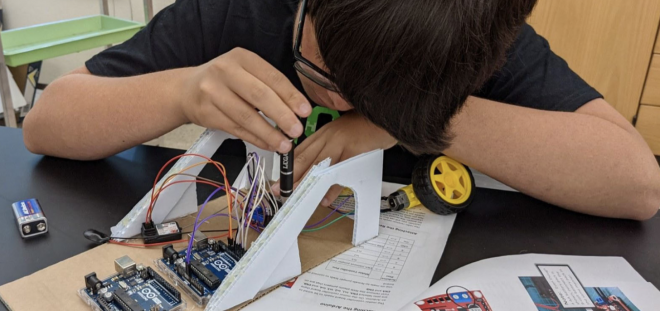 A student working on a model.